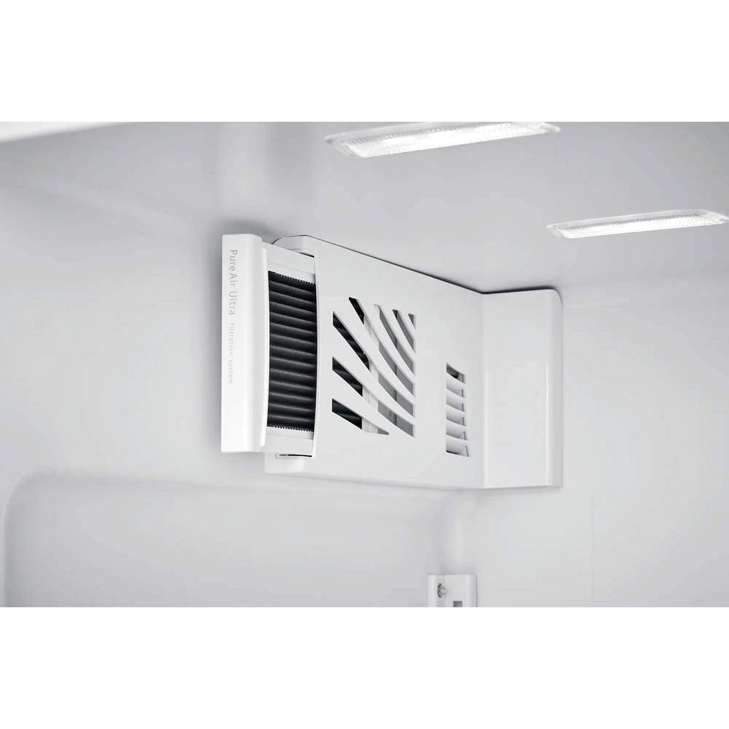 Ventilation grille on a white wall with lights above