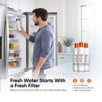 Person replacing a refrigerator water filter, showing installation of an EveryDrop Filter 2 compatible with Mountain Flow MF645.