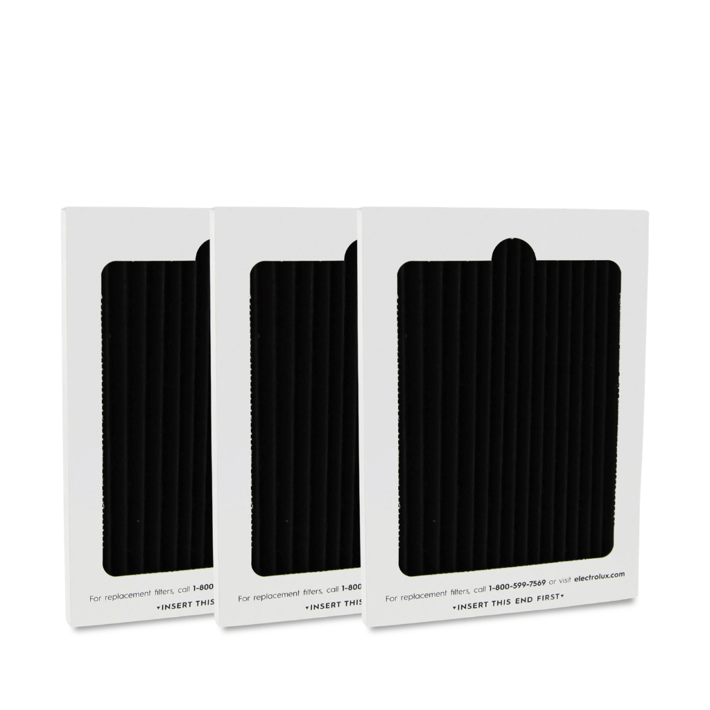 Three packages of black replacement filters on a white background