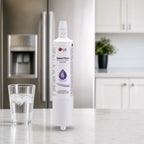 LG LT600P refrigerator water filter replacement cartridge on kitchen counter with glass of ice water, installed in fridge system to deliver clean, fresh-tasting drinking water