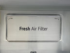 LG Refrigerator Model LRFXS2503S Air Filter with 'Fresh Air Filter' text on a silver background